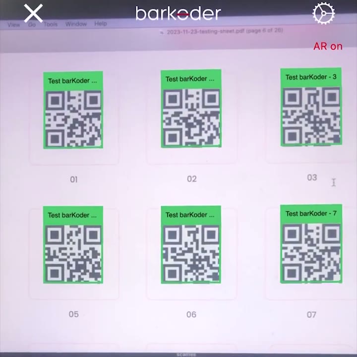 AR overlays on six QR codes; the codes already read are marked green