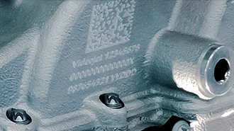 DPM code on a textured, uneven surface