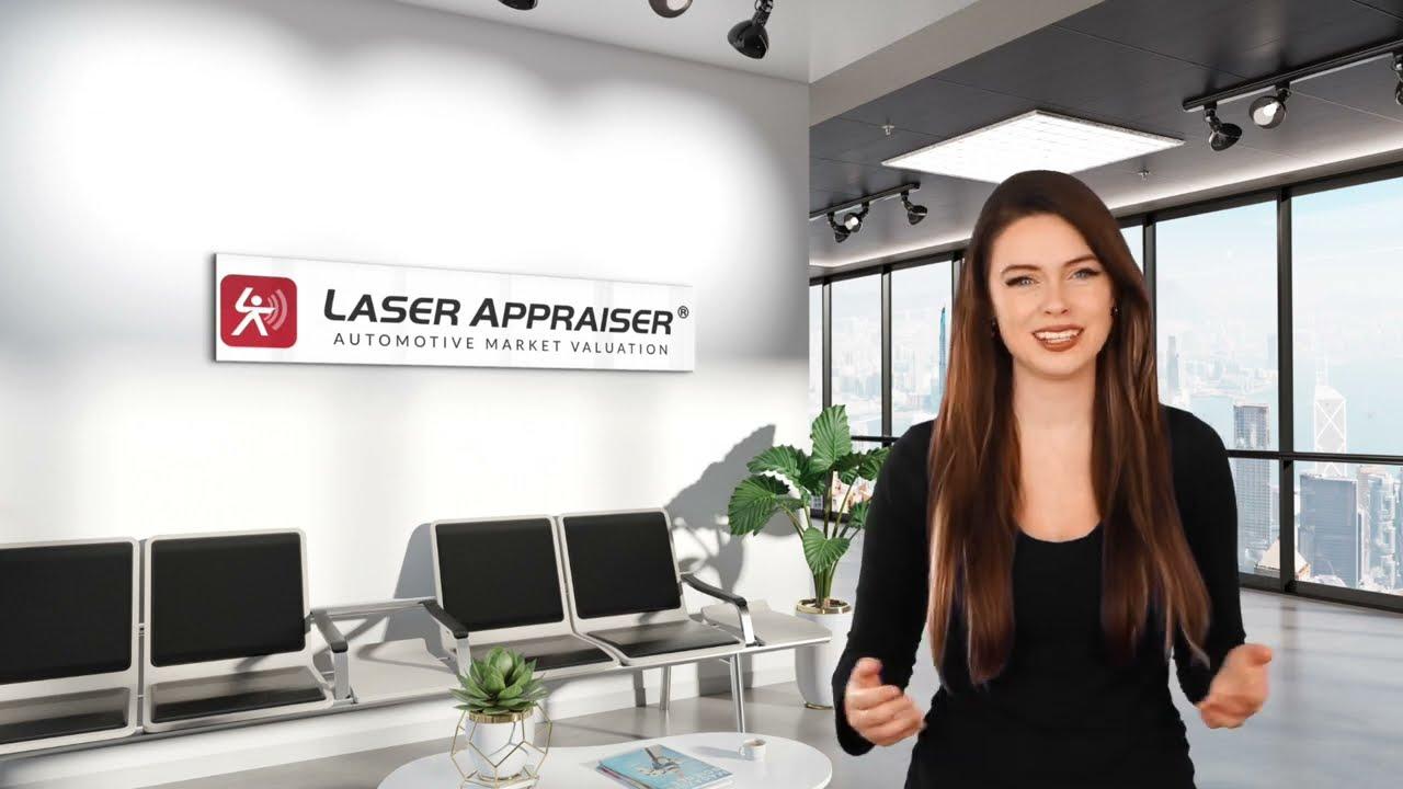 Presenter in the Laser Appraiser office lobby with the company sign on the wall