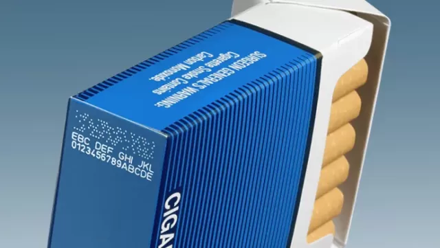 Cigarette pack with a printed DotCode and a human-readable code on its side