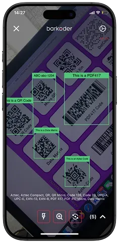 barKoder AR scanning with green labeled overlays on five decoded barcodes at an angle